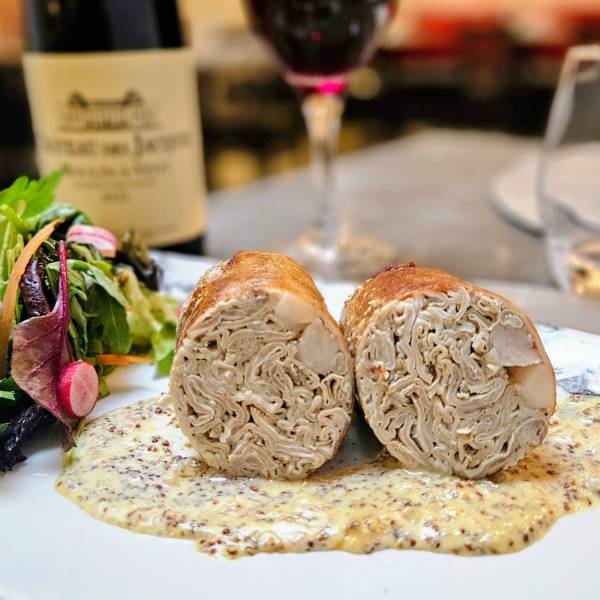 Andouillette maison, cuisine bistronomique faite maison au restaurant Le Bouchon Normand au Havre.